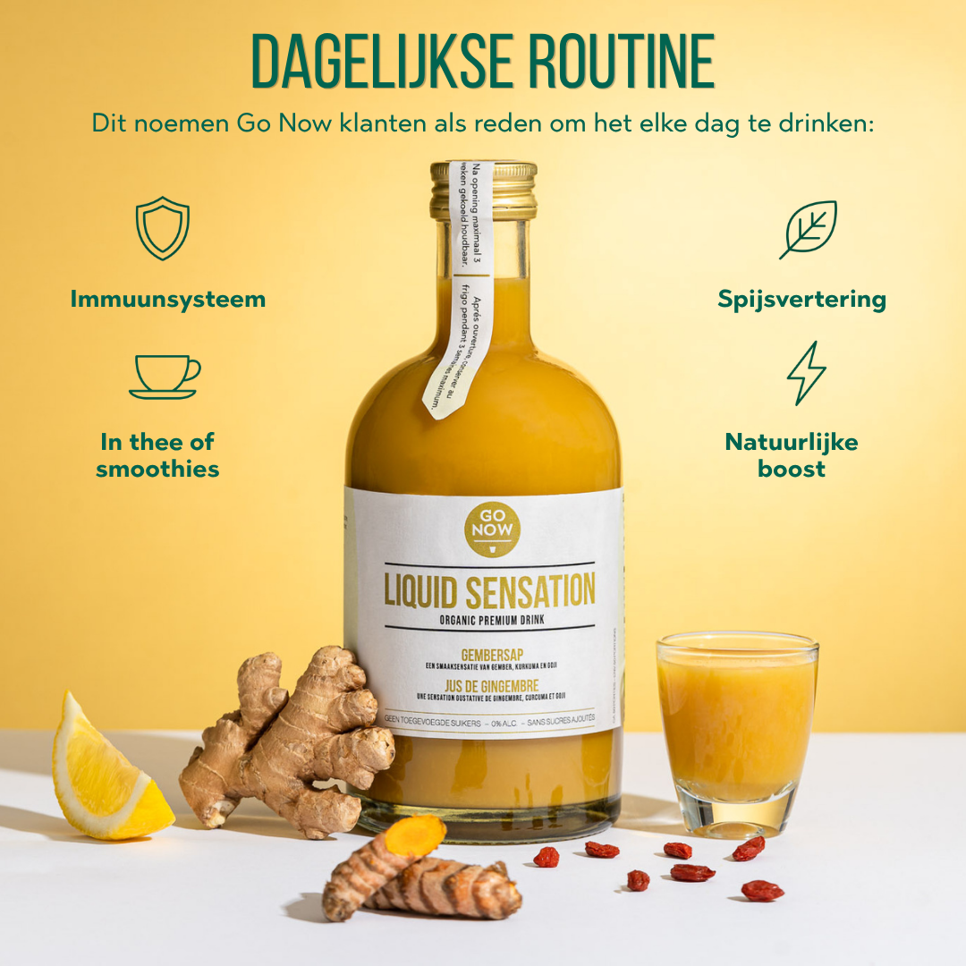 Dagelijkse routine: fles Liquid Sensation met een ingeschonken glas, gember en gojibessen op tafel