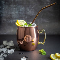 Koperen Moscow Mule-beker van Go Now met ijs, citroen en munt